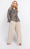 Beige Pleat Wide Leg Trousers by Vogue Williams